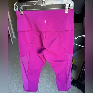 Lululemon leggings size 8 with mesh siding on the calve.